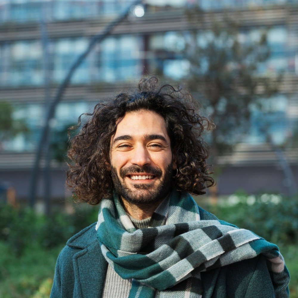 businessman looking at the camera and smile while 2025 01 09 17 50 11 utc.jpg